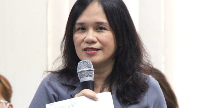 TS Thái Thị Tuyết Dung, giảng viên Đại học Kinh tế - Luật, phát biểu tại hội nghị chiều 13/7. Ảnh: Thu Hằng